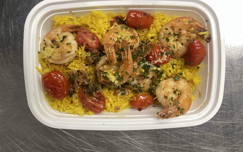 Shrimp Scampi with saffron rice and blistered cherry tomatoes